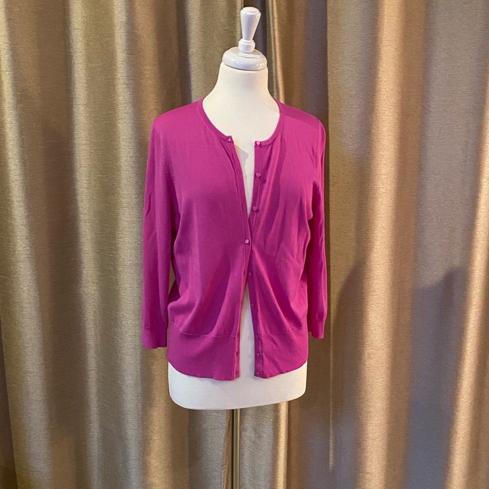 Fuchsia colored light weight cardigan.